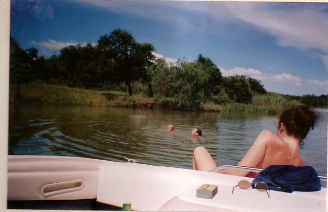 Craig & Adrian in the water. Debbie on the boat.