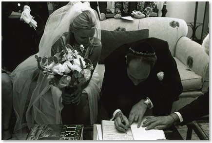 Signing the marriage document